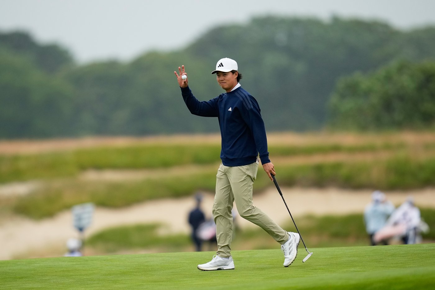 Dylan Wu laughs at himself after five-putting his first hole in the third round at the US Open | iNFOnews.ca Dylan Wu laughs at himself after five-putting his first hole in the third round at the US Open | iNFOnews.ca