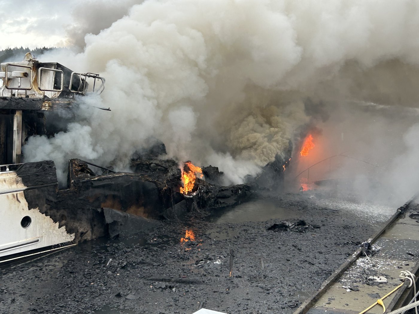 Fire chief says cause of fire that sank three yachts will likely never be found | iNFOnews.ca
