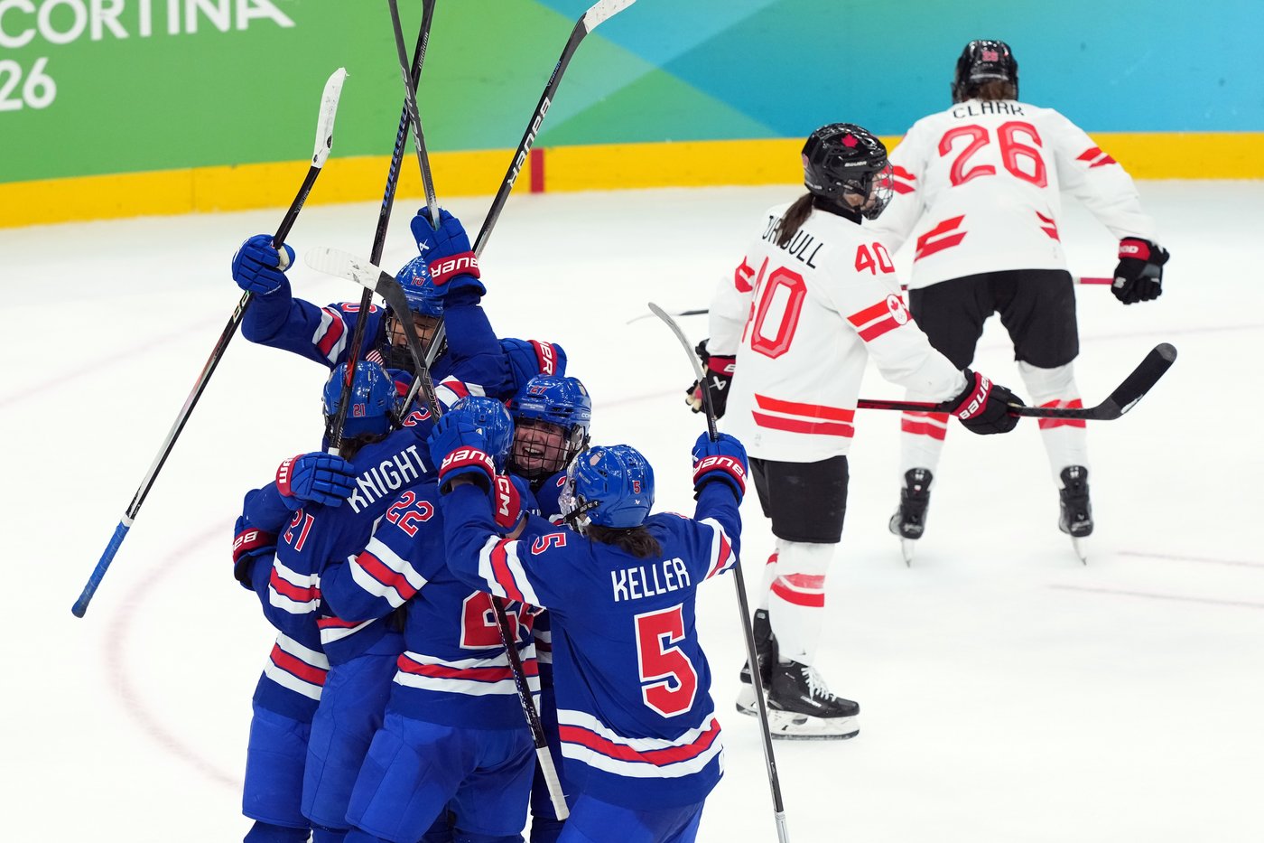 CP NewsAlert: U.S. beats Canada 2-1 in overtime for women's hcokey gold | iNFOnews.ca