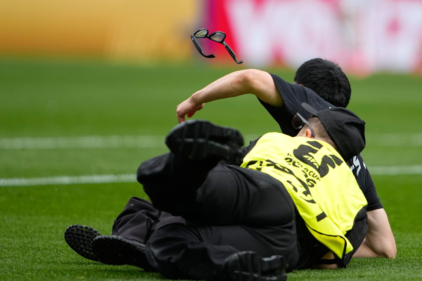 Three people run onto field and stop play during the World Cup match between Belgium and Senegal | iNFOnews.ca