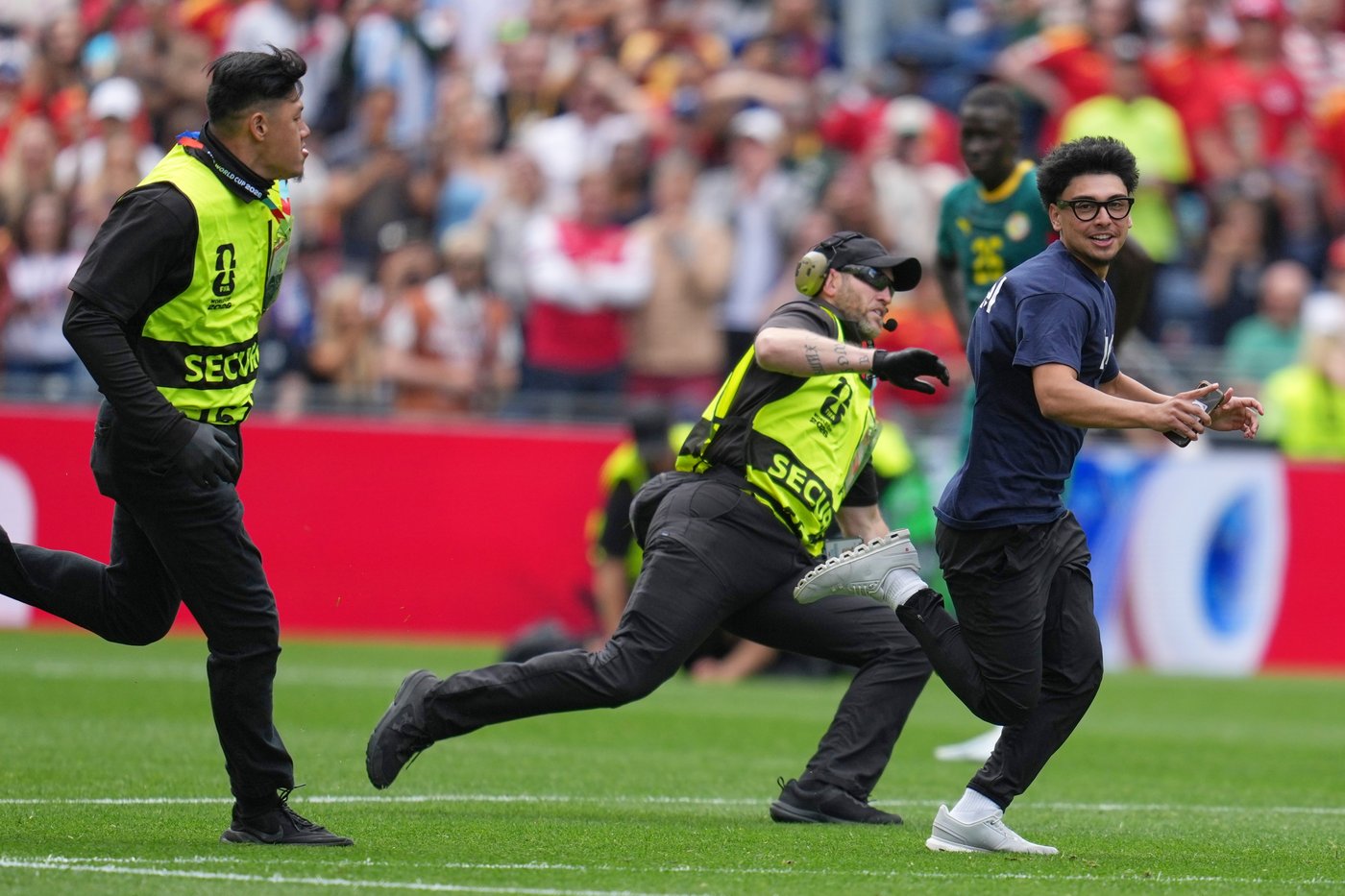 Three people run onto field and stop play during the World Cup match between Belgium and Senegal | iNFOnews.ca