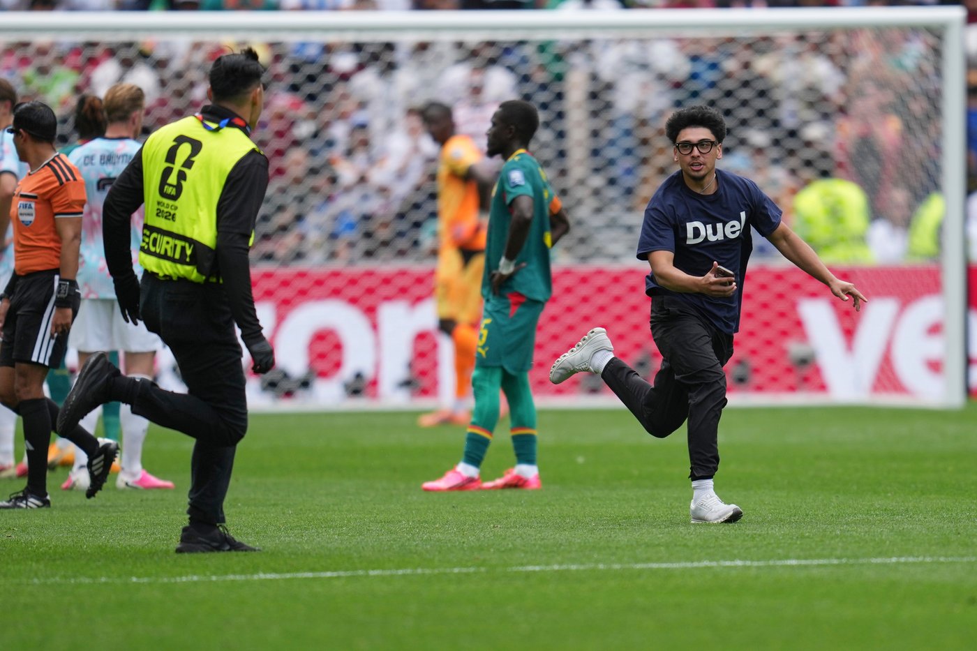 Three people run onto field and stop play during the World Cup match between Belgium and Senegal | iNFOnews.ca