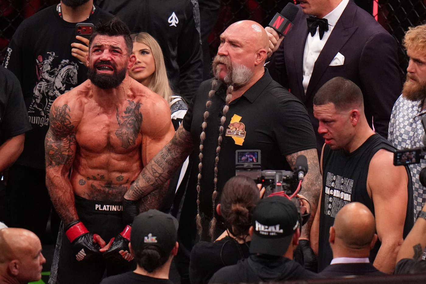 Mike Perry bloodies and beats Nate Diaz in 2 rounds on Rousey-Carano undercard | iNFOnews.ca