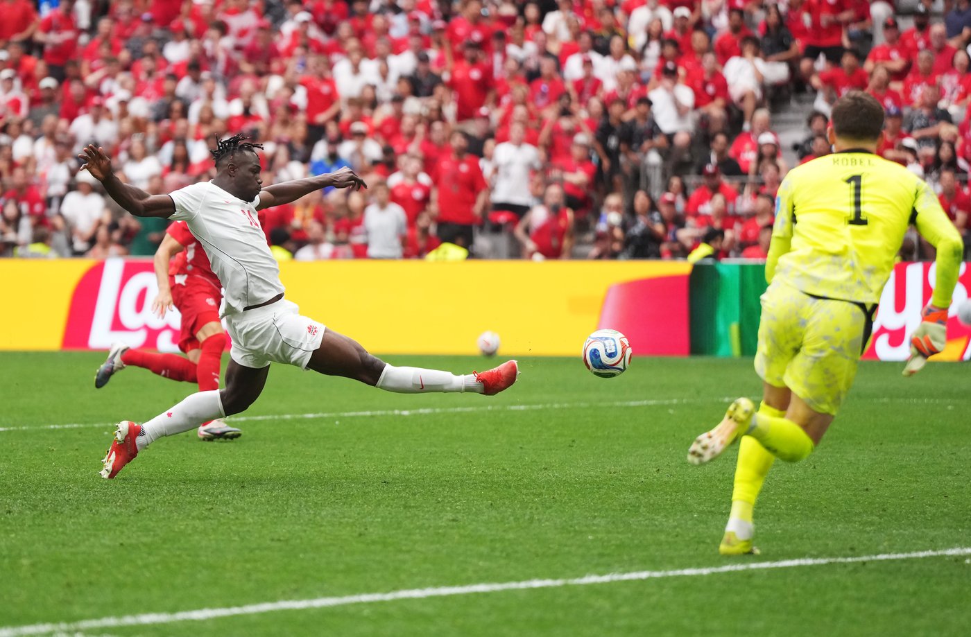Canada falls 2-1 to Switzerland, advances to FIFA World Cup knockout round | iNFOnews.ca Canada falls 2-1 to Switzerland, advances to FIFA World Cup knockout round | iNFOnews.ca
