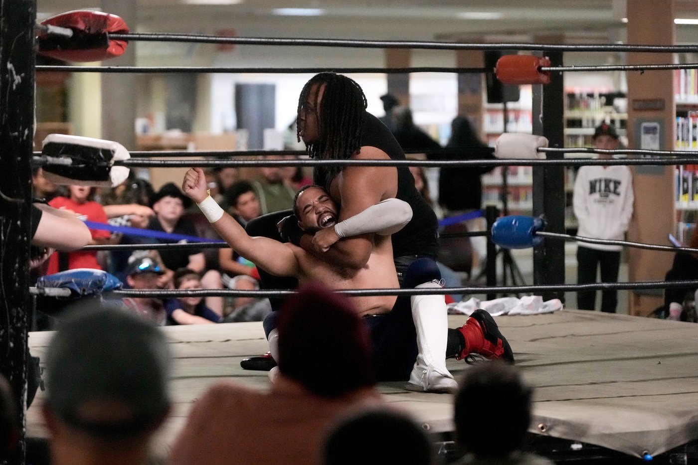 Wrestling matches provide an action-packed story time at US libraries, in photos | iNFOnews.ca