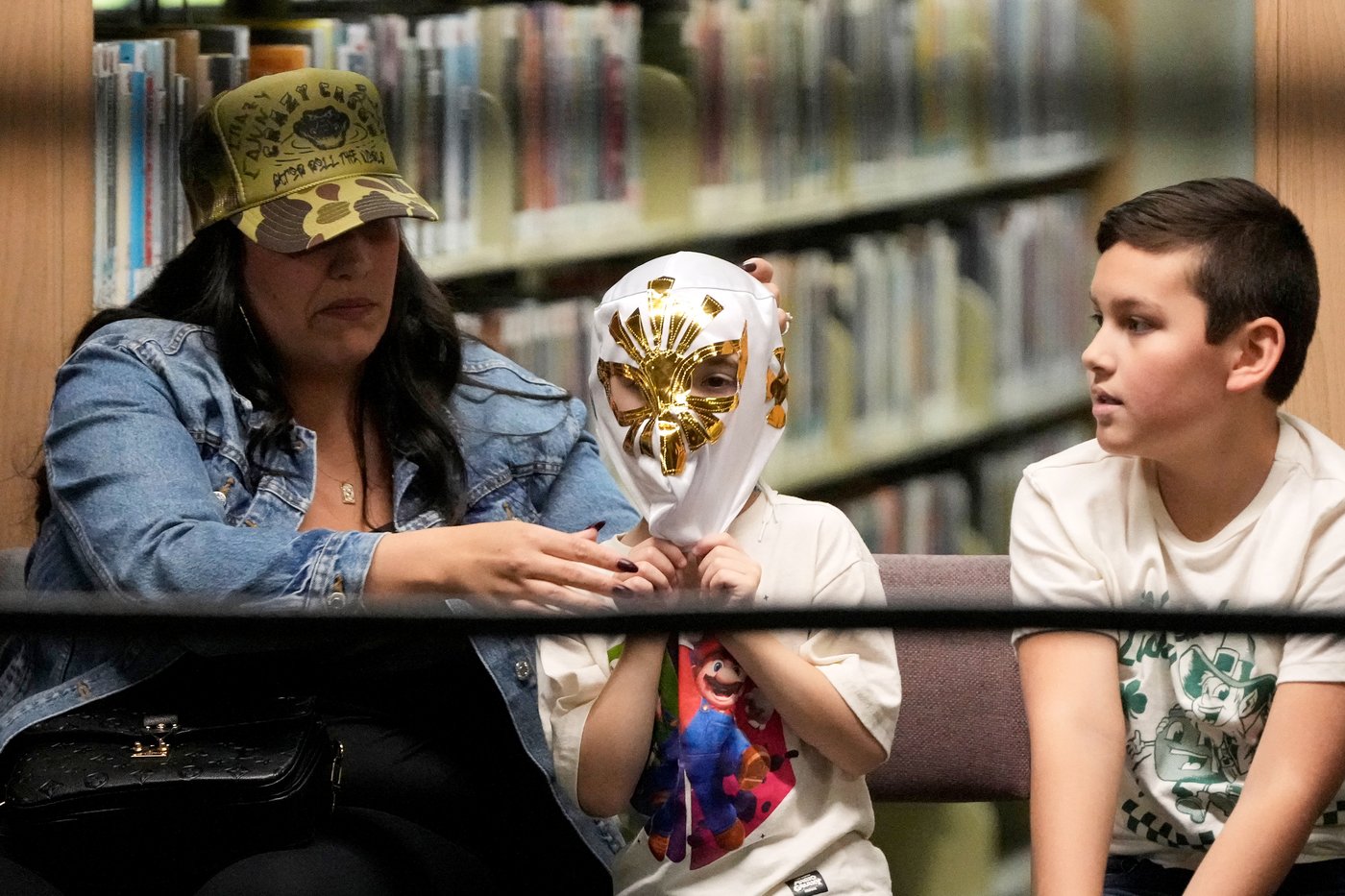 Wrestling matches provide an action-packed story time at US libraries, in photos | iNFOnews.ca