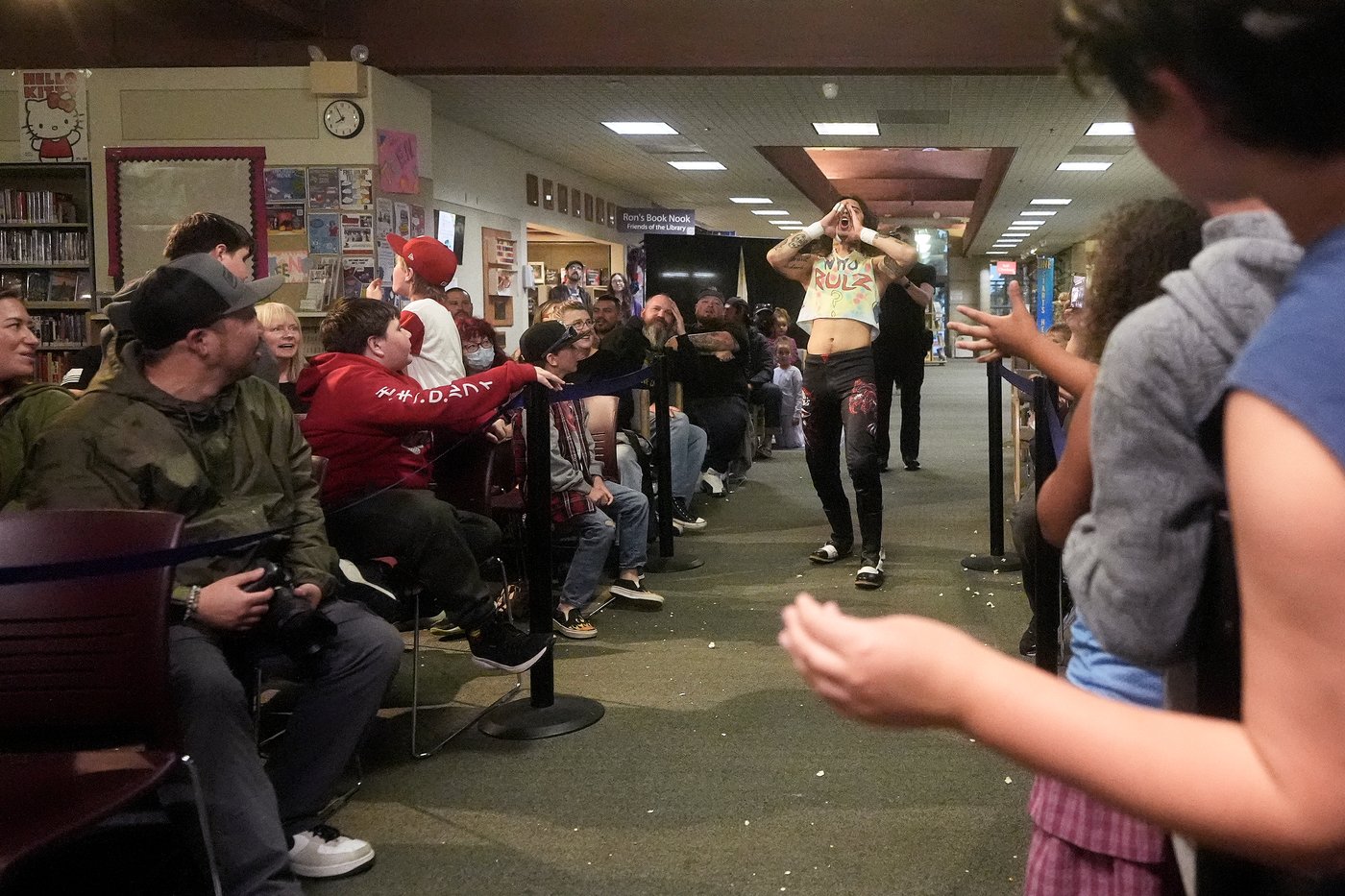 Wrestling matches provide an action-packed story time at US libraries, in photos | iNFOnews.ca