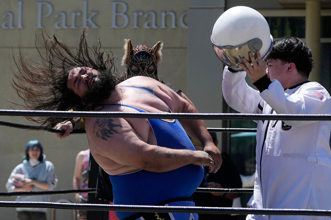 Wrestling matches provide an action-packed story time at US libraries, in photos | iNFOnews.ca