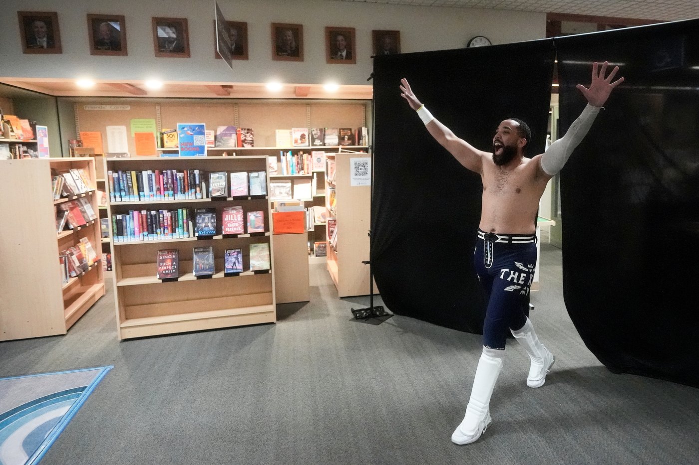 Wrestling matches provide an action-packed story time at US libraries, in photos | iNFOnews.ca