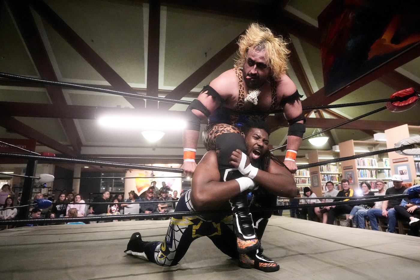 Wrestling matches provide an action-packed story time at US libraries, in photos | iNFOnews.ca