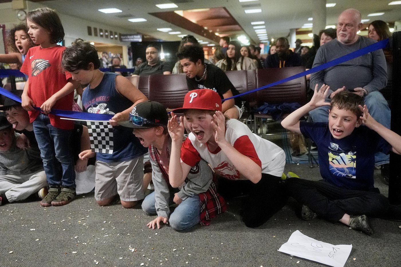 Wrestling matches provide an action-packed story time at US libraries, in photos | iNFOnews.ca