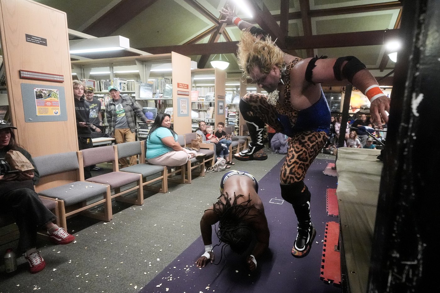 Wrestling matches provide an action-packed story time at US libraries, in photos | iNFOnews.ca