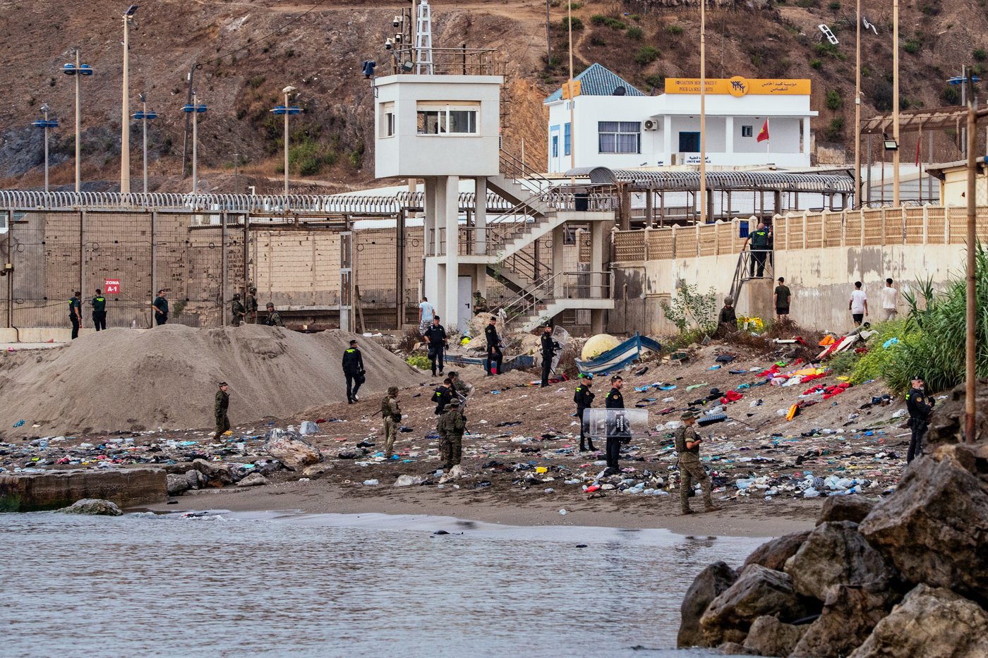 Spain installs sea barrier on Ceuta's border with Morocco after frontier rush that killed 67 | iNFOnews.ca Spain installs sea barrier on Ceuta's border with Morocco after frontier rush that killed 67 | iNFOnews.ca