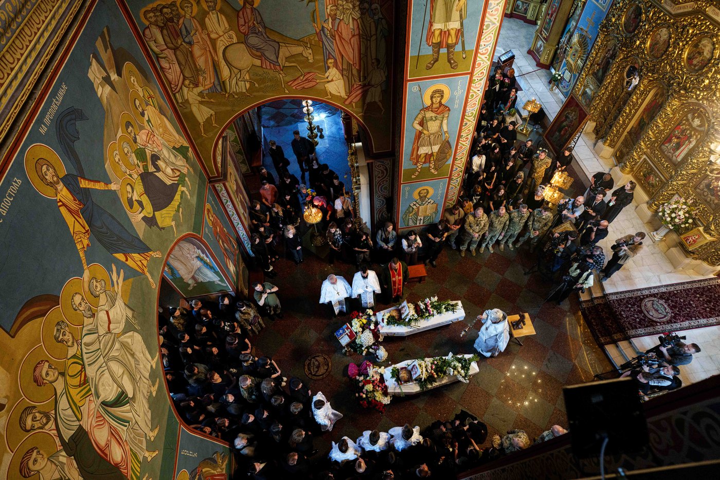 Kyiv holds a funeral for 2 young sisters killed by a Russian missile strike | iNFOnews.ca