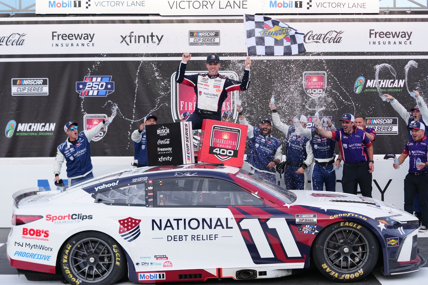 Denny Hamlin dedicates NASCAR victory at Michigan to Kyle Busch after tying him on career win list | iNFOnews.ca