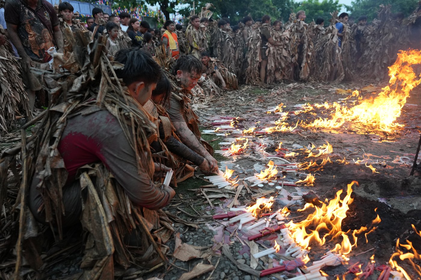 Philippine devotees honor St. John the Baptist with a mud-covered display of faith | iNFOnews.ca