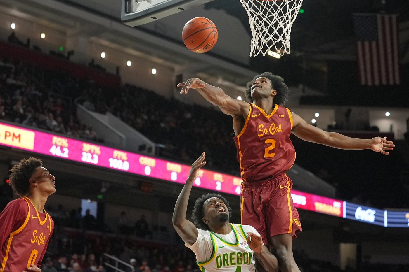 Evans scores 21 points and keys Oregon's 59-second, 7-0 run to stun USC 71-70 | iNFOnews.ca