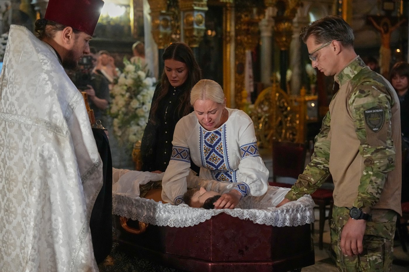 Ukraine honors its 'collector of souls' volunteer killed while recovering the war dead | iNFOnews.ca Ukraine honors its 'collector of souls' volunteer killed while recovering the war dead | iNFOnews.ca