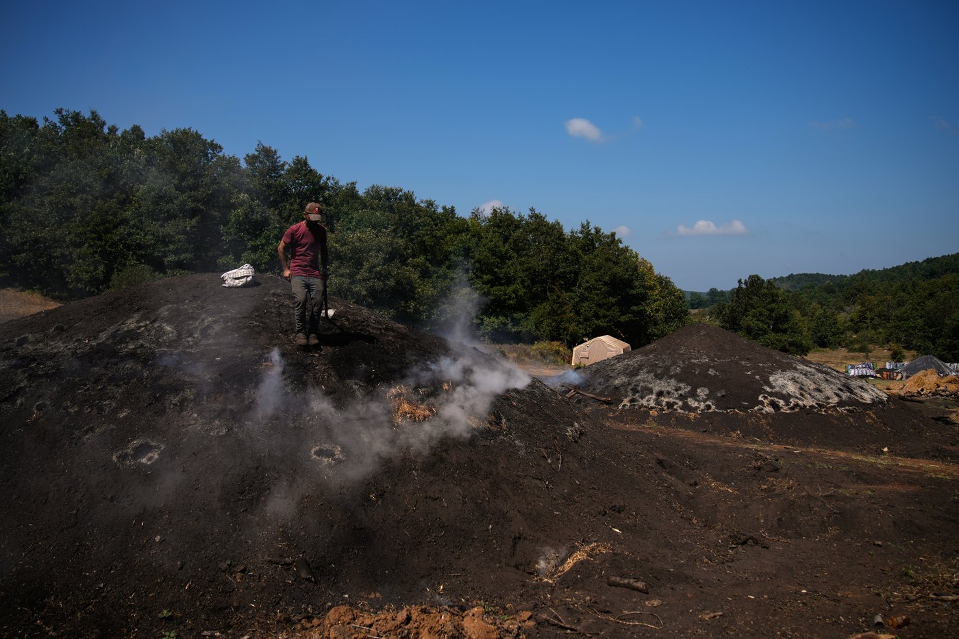 Father and sons keep a traditional charcoal craft alive, in photos | iNFOnews.ca