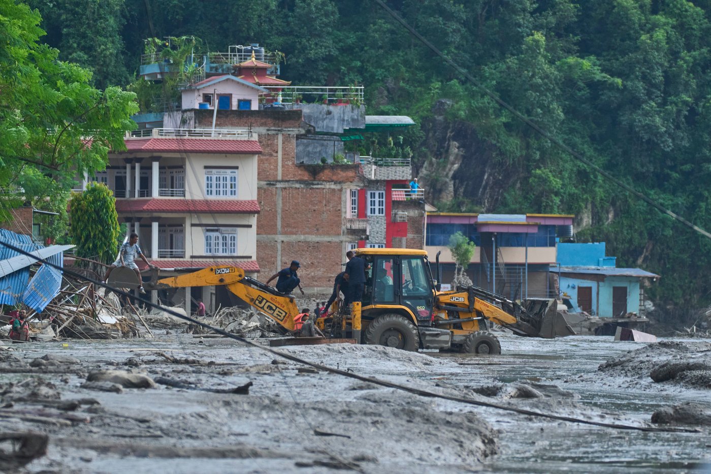 Photos show aftermath of flash floods in Nepal | iNFOnews.ca