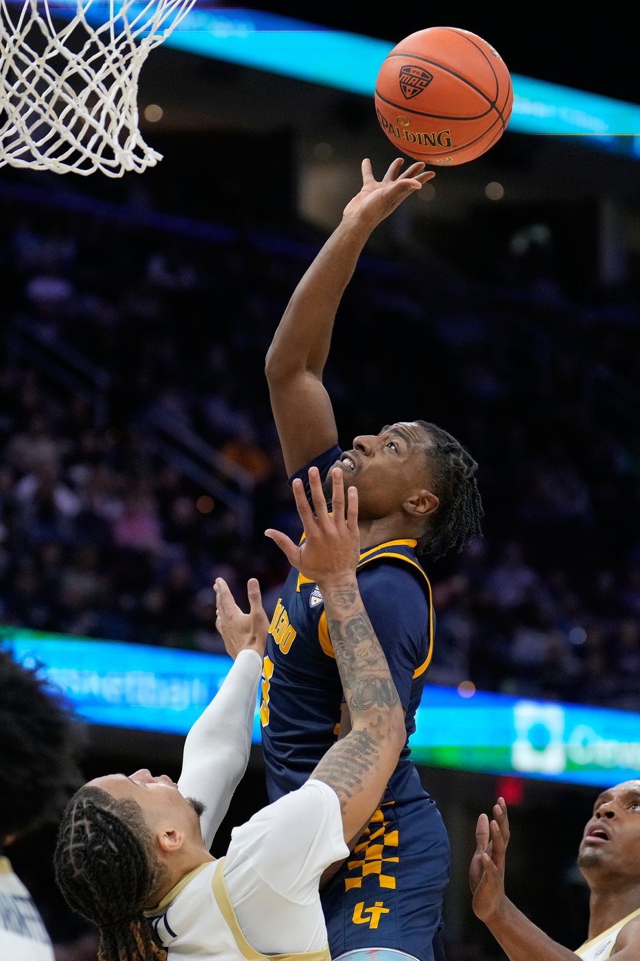 Scott's deep 3-point bomb sends Akron past Toledo, 79-76 for 3rd straight MAC crown | iNFOnews.ca Scott's deep 3-point bomb sends Akron past Toledo, 79-76 for 3rd straight MAC crown | iNFOnews.ca