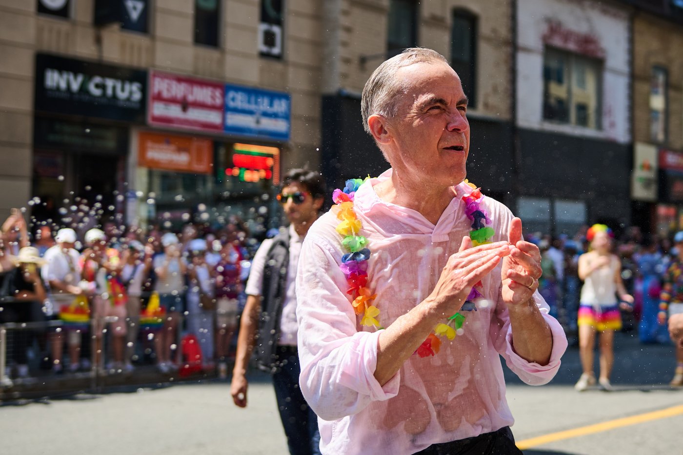 Revellers drench Mark Carney with water as Toronto celebrates Pride Parade | iNFOnews.ca