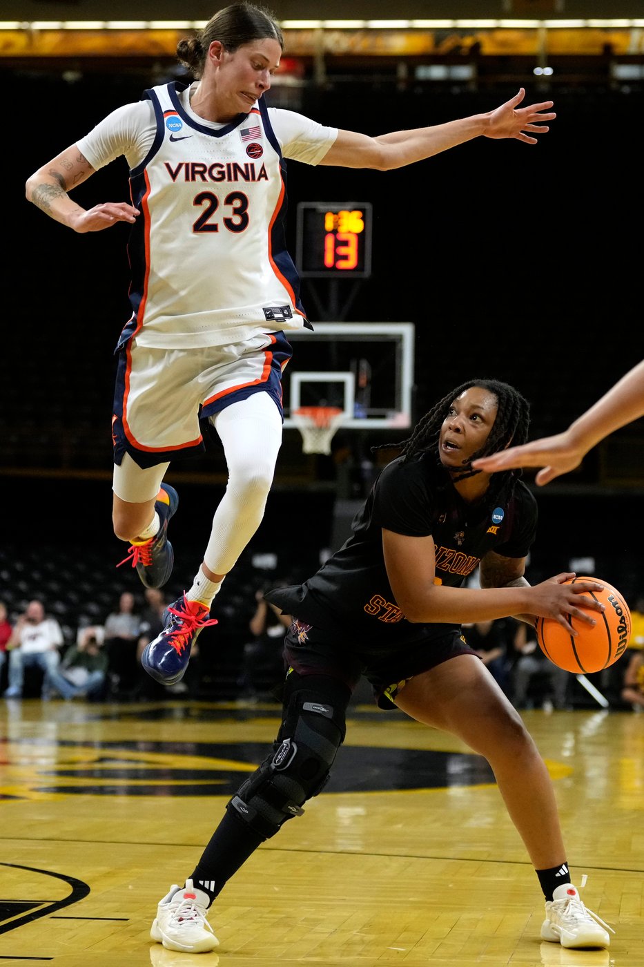 Johnson sinks go-ahead 3-pointer and Virginia beats Arizona State 57-55 in women's First Four | iNFOnews.ca