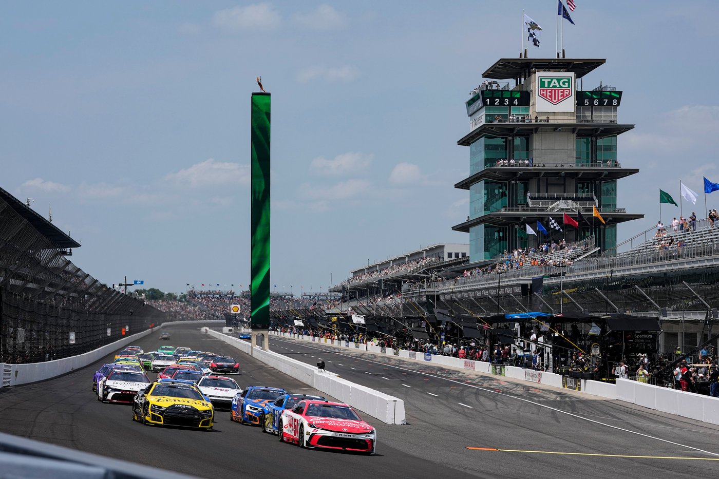 Corey Heim executes daring pass on final restart and holds on for historic Brickyard 400 victory | iNFOnews.ca