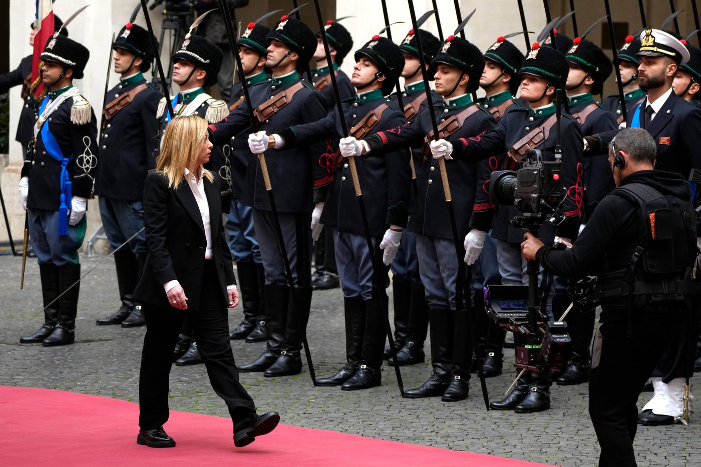 From black boots to pastel suits, Italian premier's wardrobe evolves with her politics | iNFOnews.ca