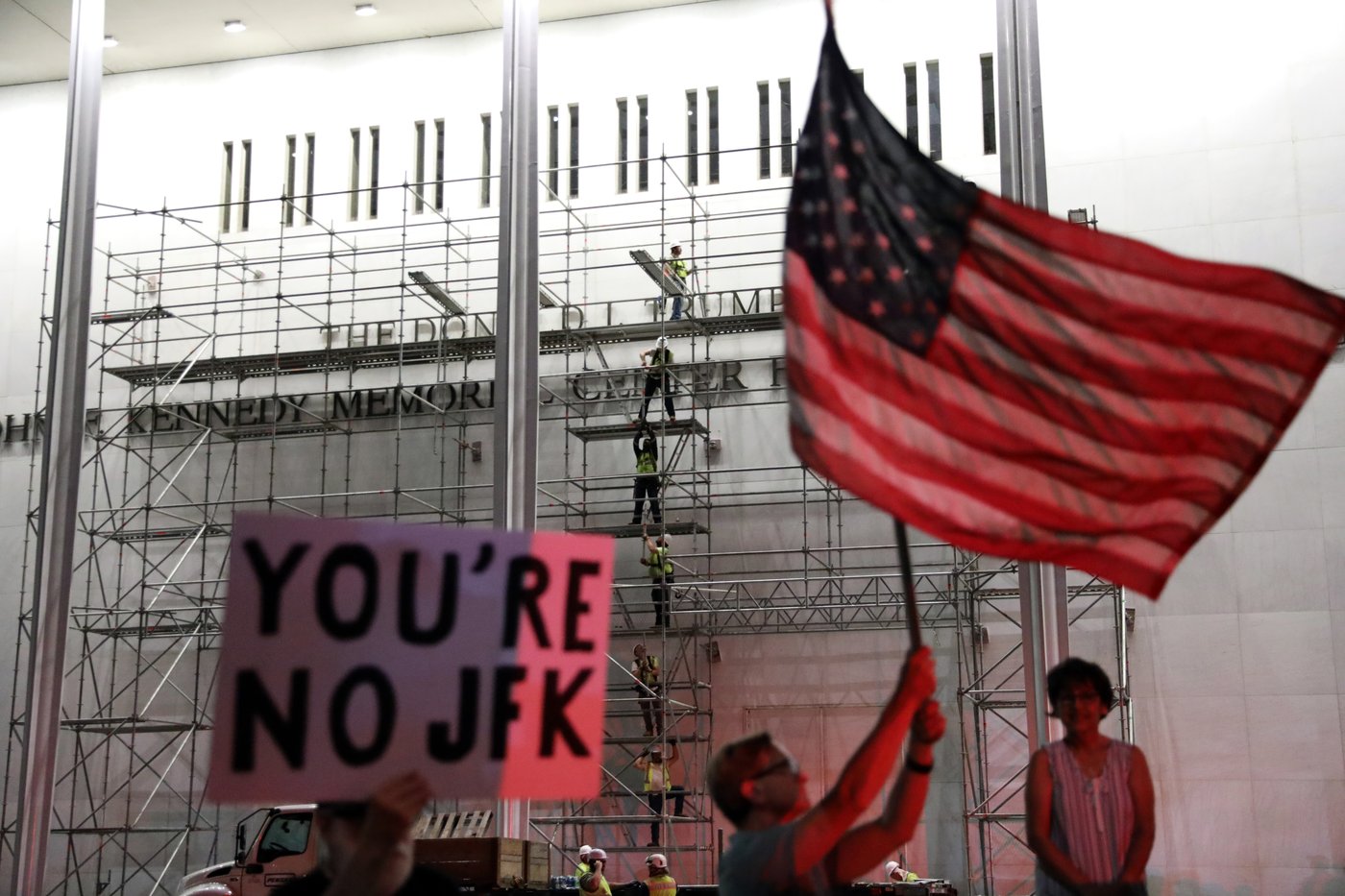 Workers begin to remove Trump's name from the Kennedy Center, in photos | iNFOnews.ca