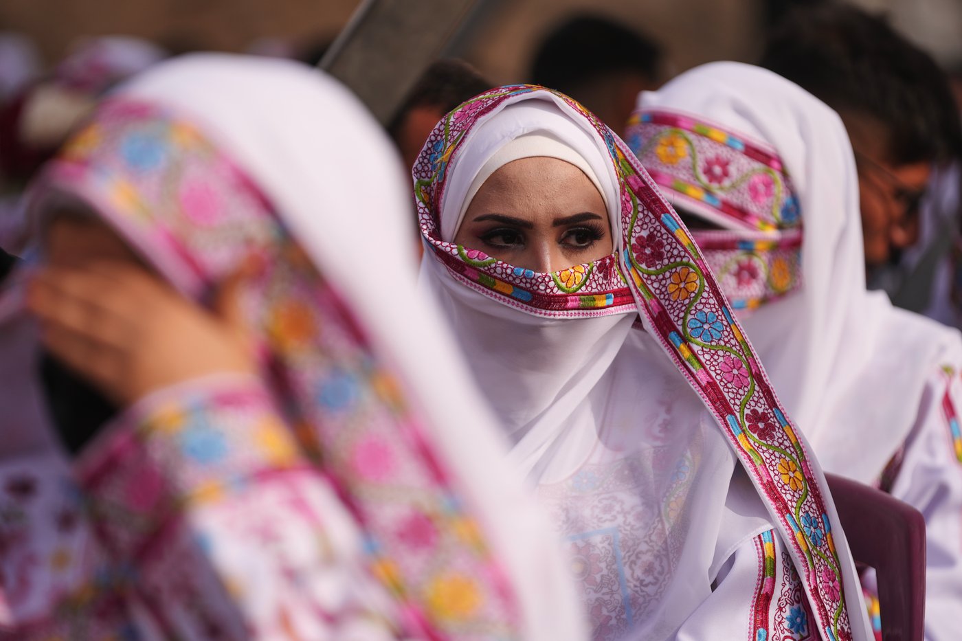 Photos show Palestinian couples celebrating a mass wedding in Gaza | iNFOnews.ca