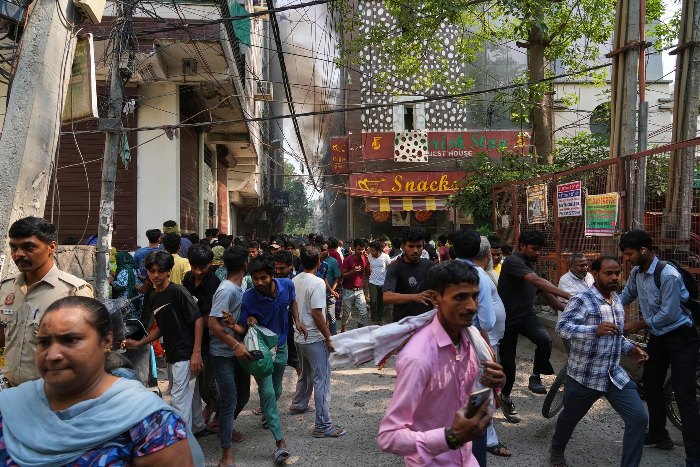 Photos show a rescue operation in a New Delhi hotel fire | iNFOnews.ca
