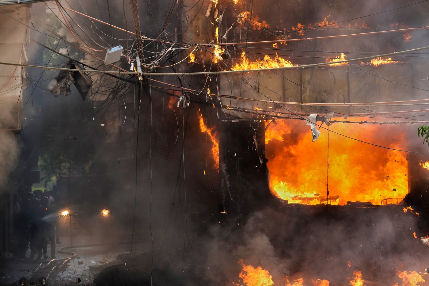 Photos show a rescue operation in a New Delhi hotel fire | iNFOnews.ca