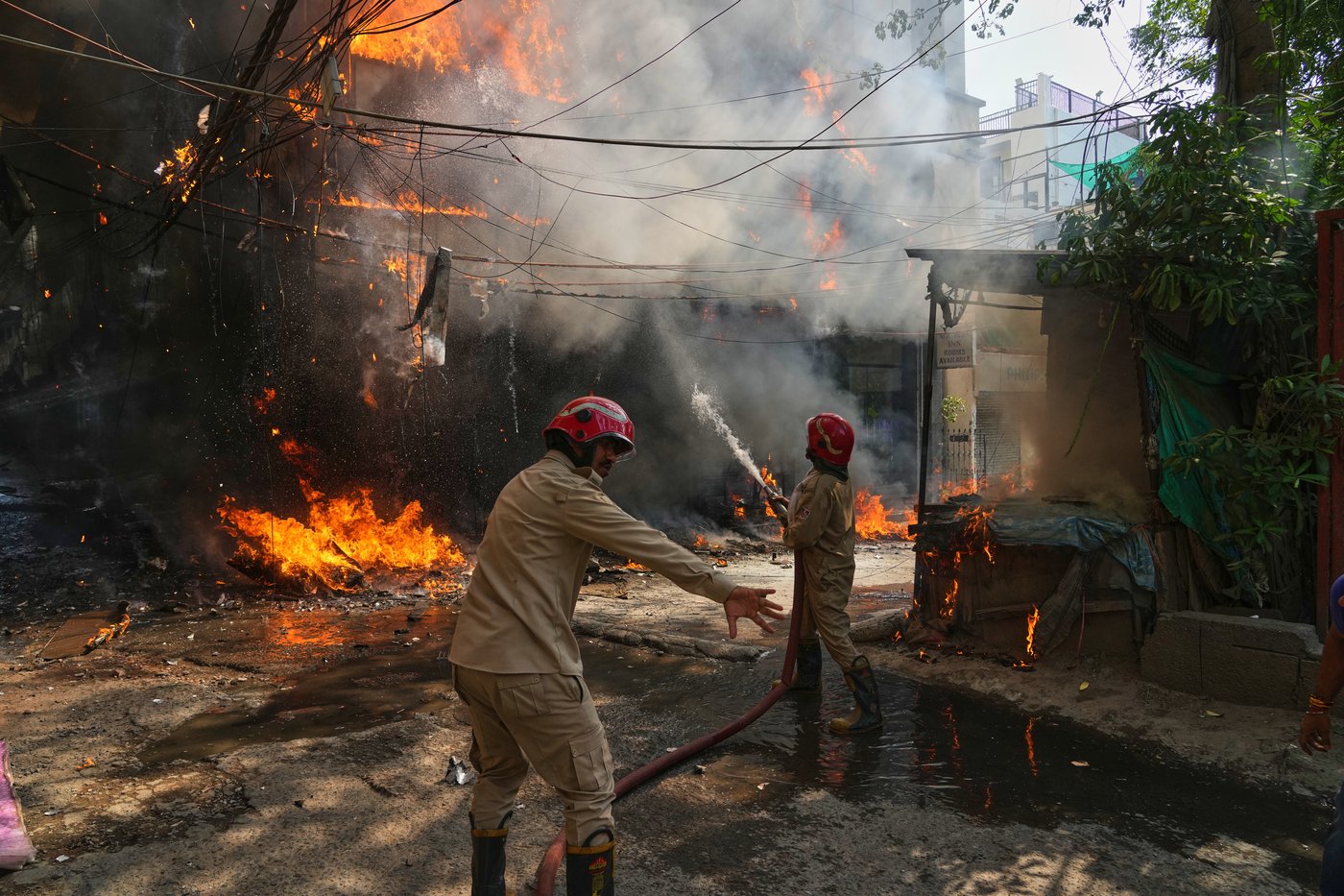 Photos show a rescue operation in a New Delhi hotel fire | iNFOnews.ca