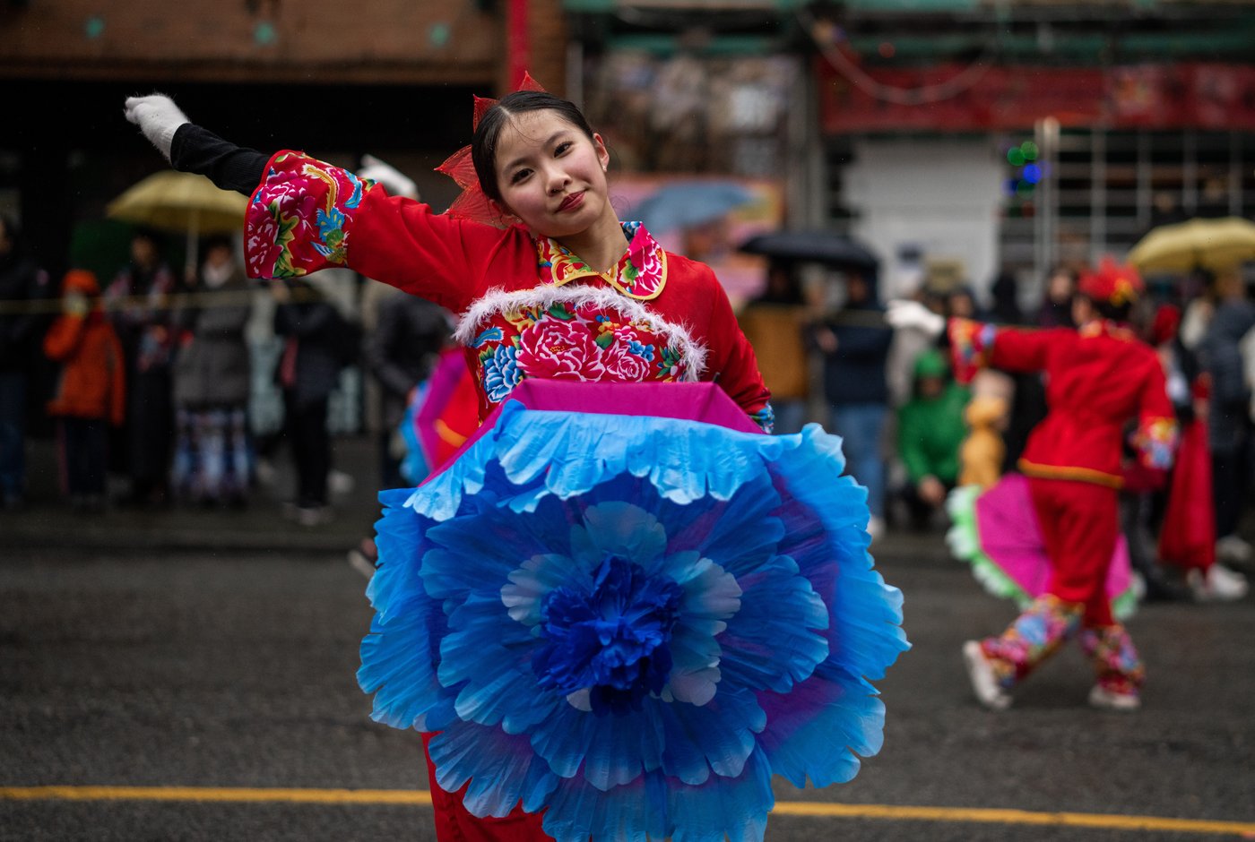 How three sisters honour mother's legacy at Vancouver's Lunar New Year parade | iNFOnews.ca