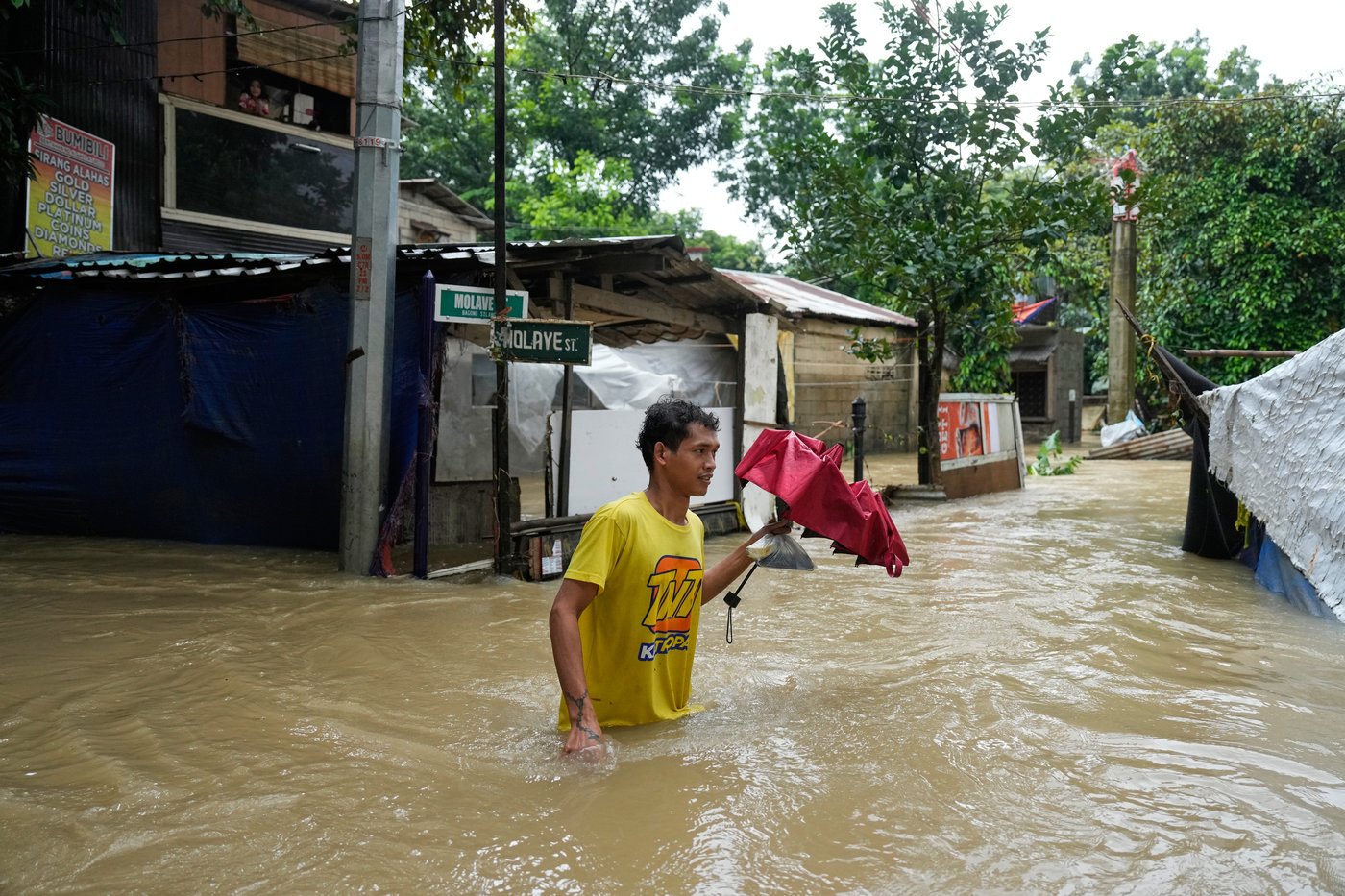 Photos show flooding and storm damage in the Philippines | iNFOnews.ca