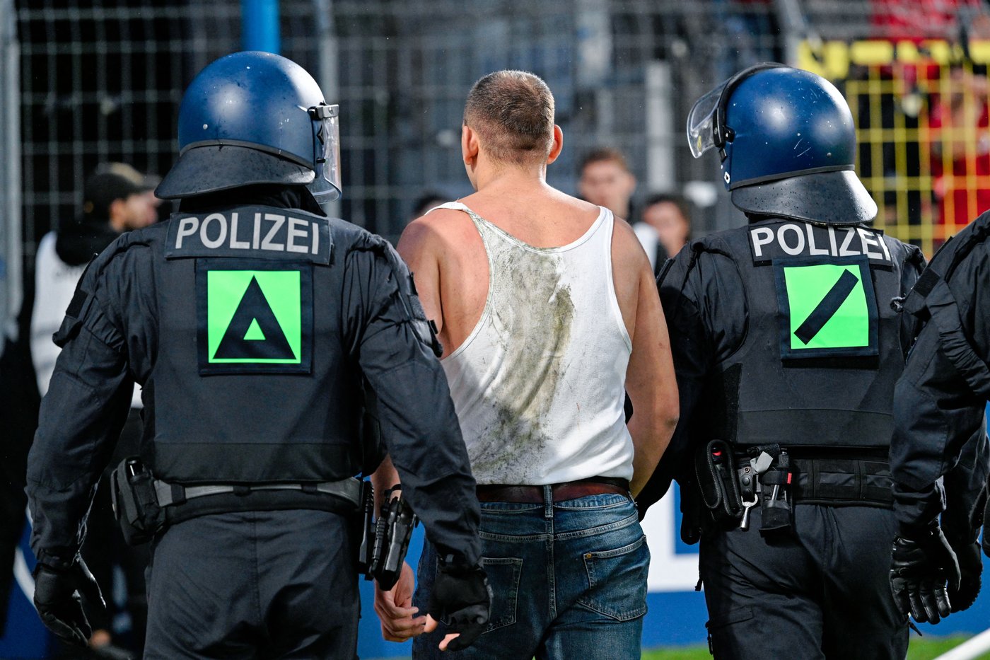 German Cup match marred by fireworks, pitch invasion | iNFOnews.ca