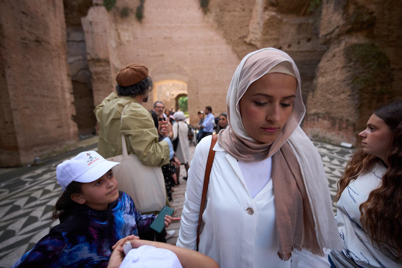 Families evacuated from Gaza enjoy a day to decompress at Rome's ancient baths | iNFOnews.ca