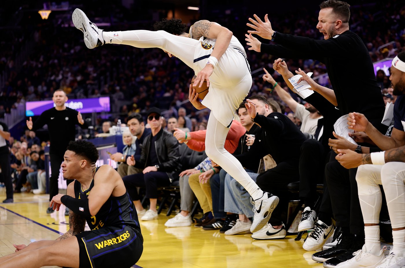 Podziemski's late scoring leads Warriors to a 128-117 win over the Nuggets | iNFOnews.ca Podziemski's late scoring leads Warriors to a 128-117 win over the Nuggets | iNFOnews.ca