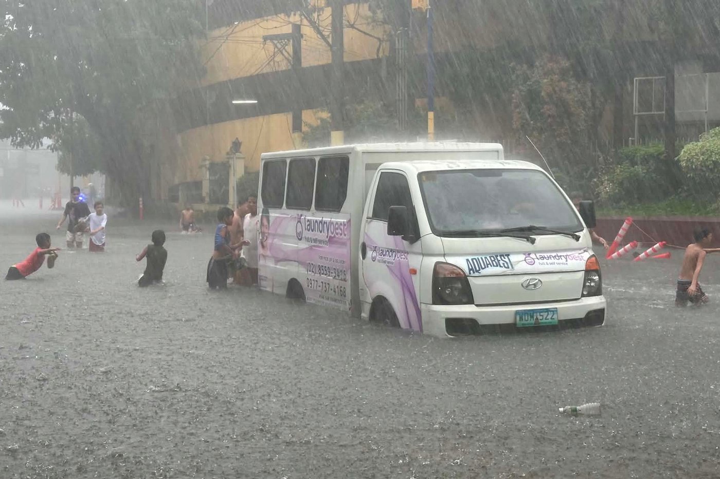 Heavy rains kill 1 in South Korea and flood major streets in Philippines | iNFOnews.ca