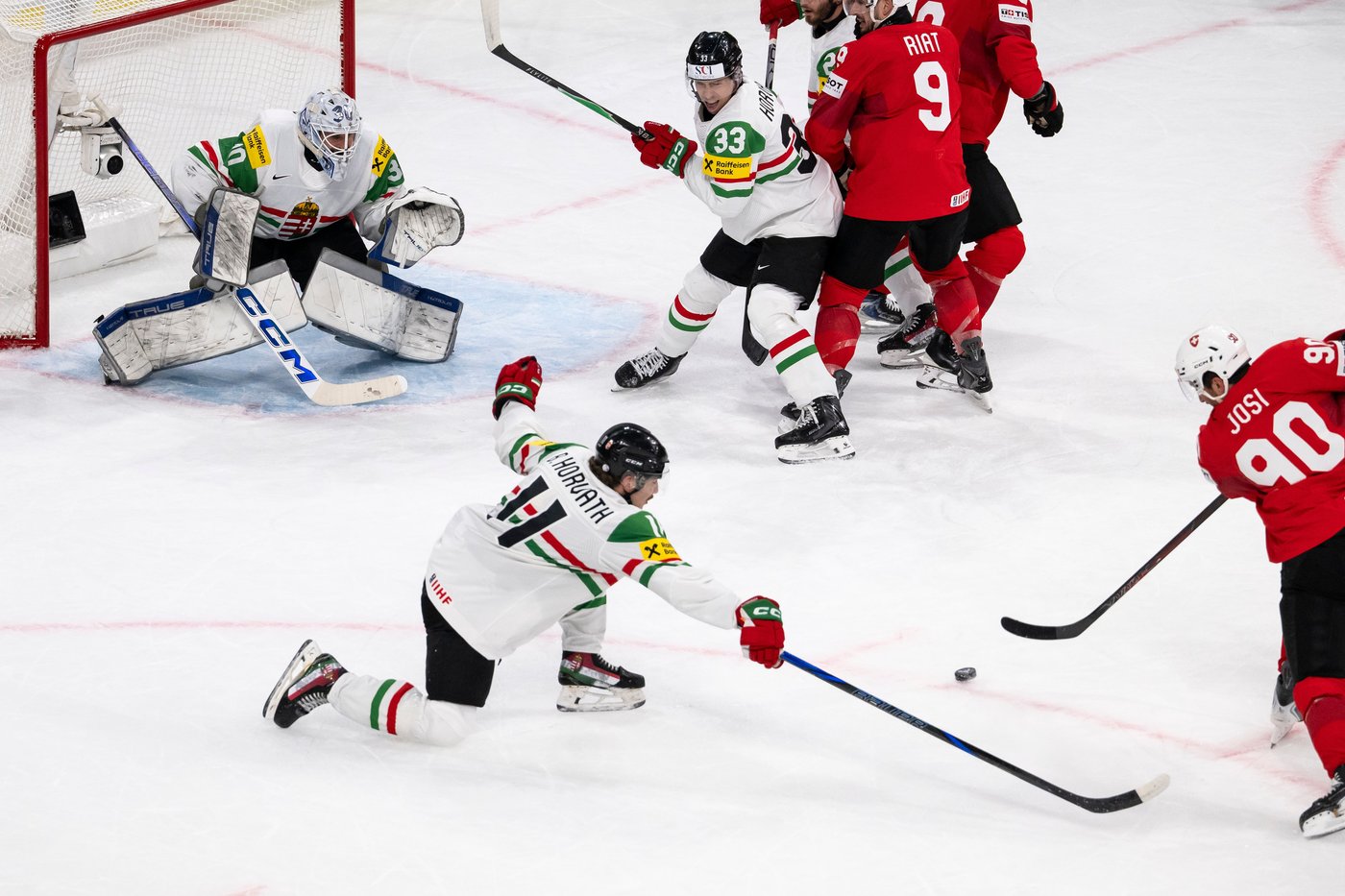 Latvia stuns the US and the Swiss rout Hungary at ice hockey worlds | iNFOnews.ca