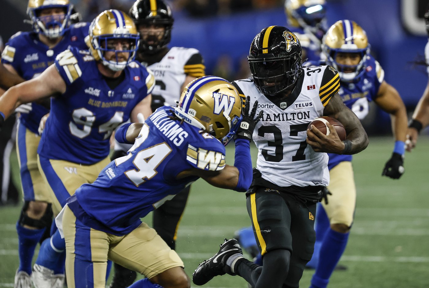 Mitchell tosses three TDs in Ticats' 37-27 win over Blue Bombers | iNFOnews.ca