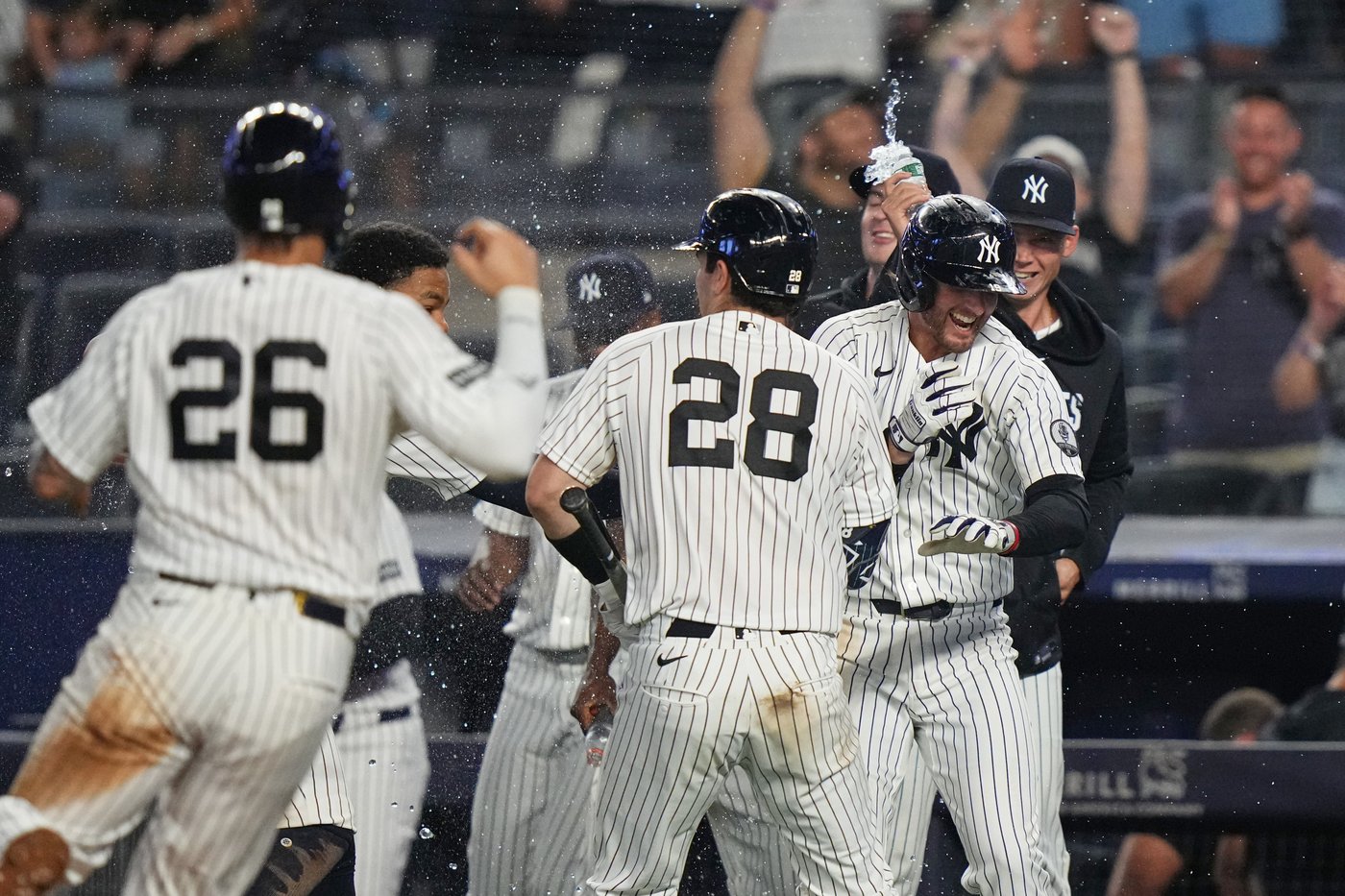 Yankees rally with 2 outs in 9th inning and beat Braves 3-2 in 10 after long rain delay | iNFOnews.ca