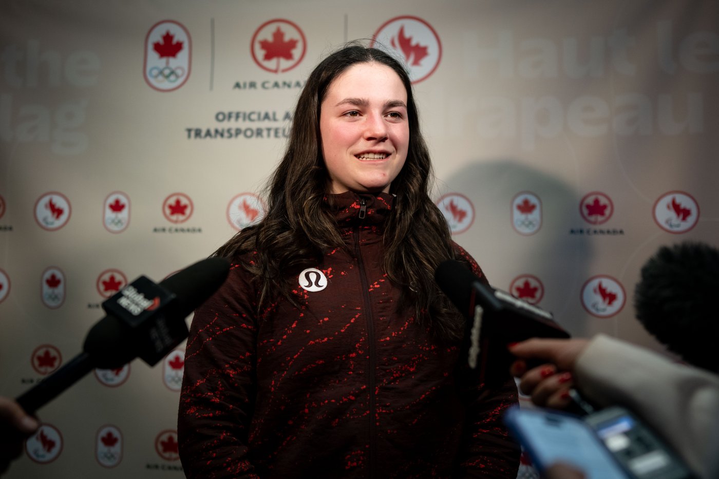 Photo Gallery: Canada's Olympians arrive home | iNFOnews.ca