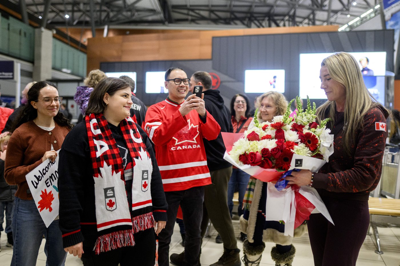 Photo Gallery: Canada's Olympians arrive home | iNFOnews.ca