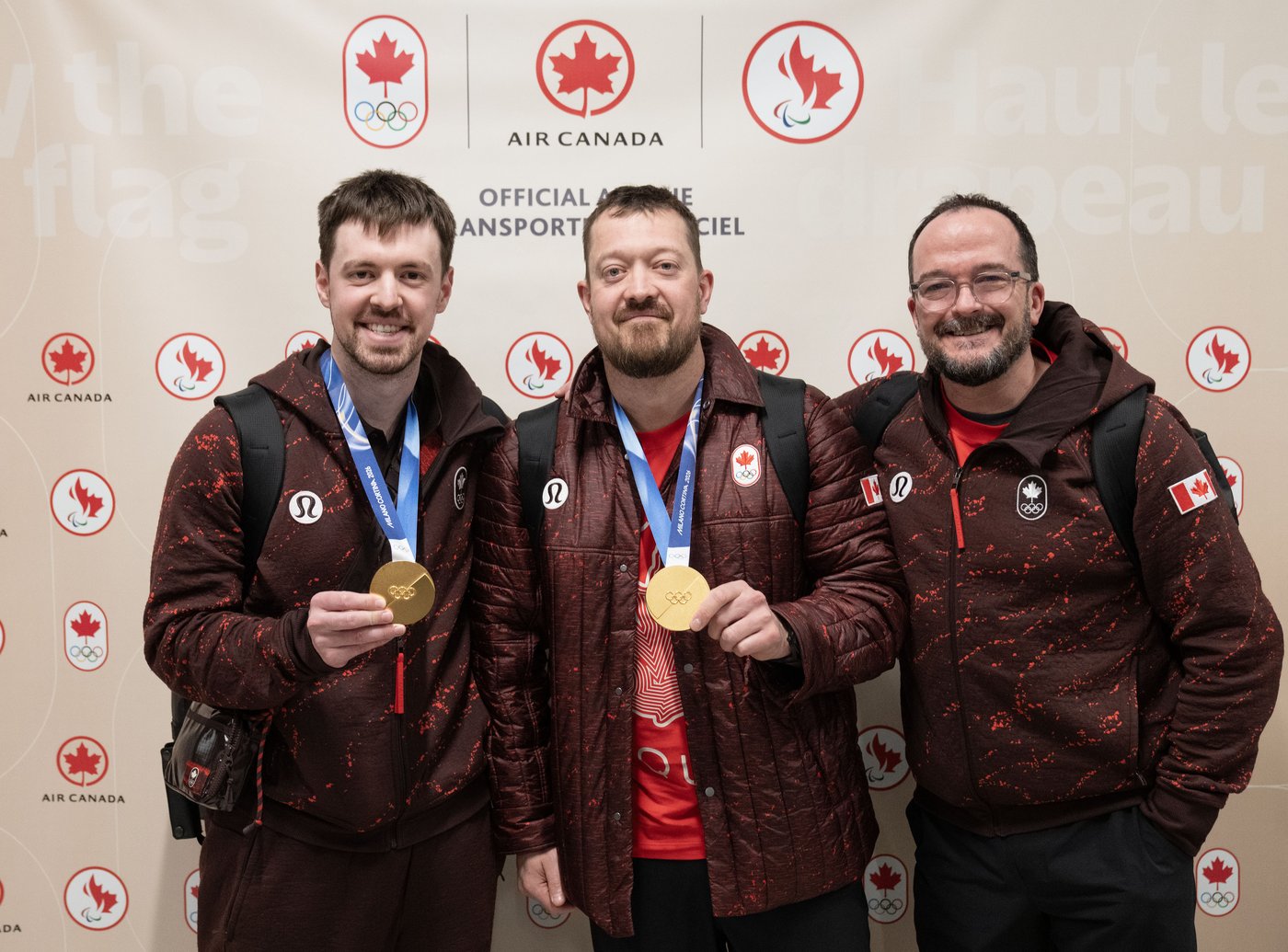 Photo Gallery: Canada's Olympians arrive home | iNFOnews.ca