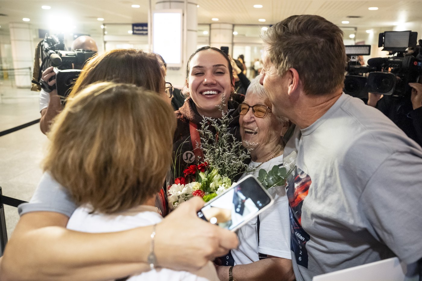 Photo Gallery: Canada's Olympians arrive home | iNFOnews.ca