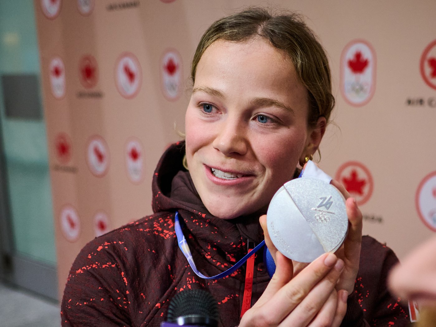Photo Gallery: Canada's Olympians arrive home | iNFOnews.ca