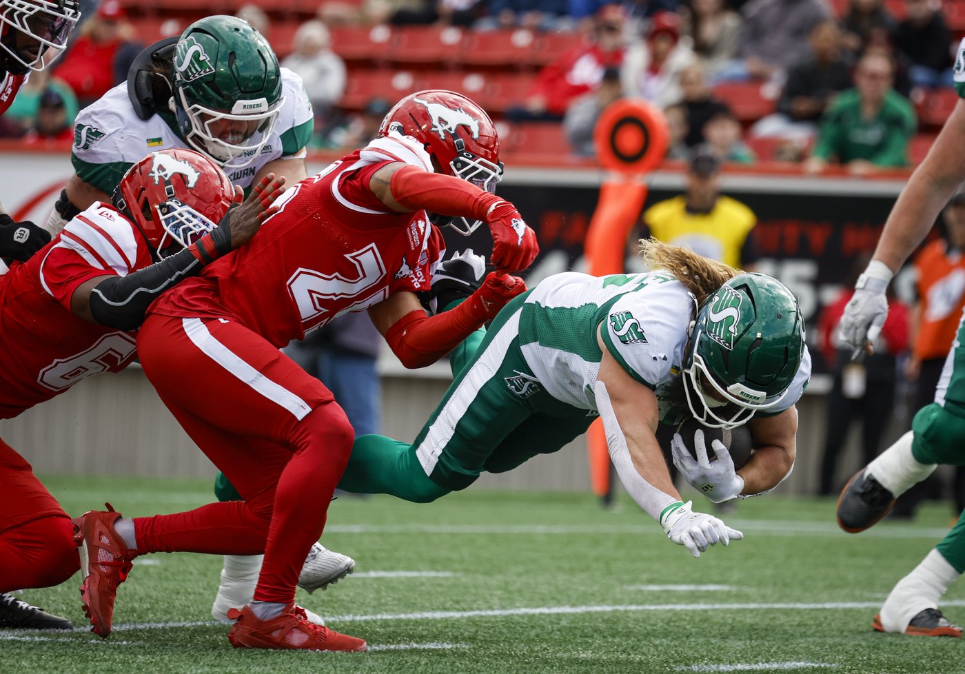 Roughriders fend off Stampeders' comeback and stiff wind at McMahon for 40-37 OT win | iNFOnews.ca