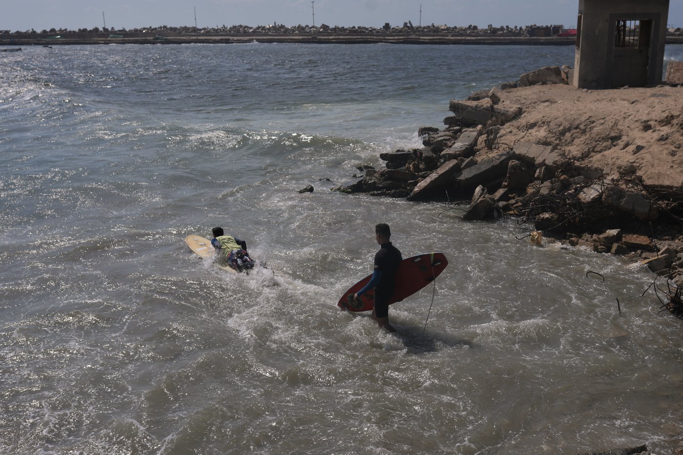 Surfers in war-torn Gaza find rare moments of joy taking to the waves | iNFOnews.ca